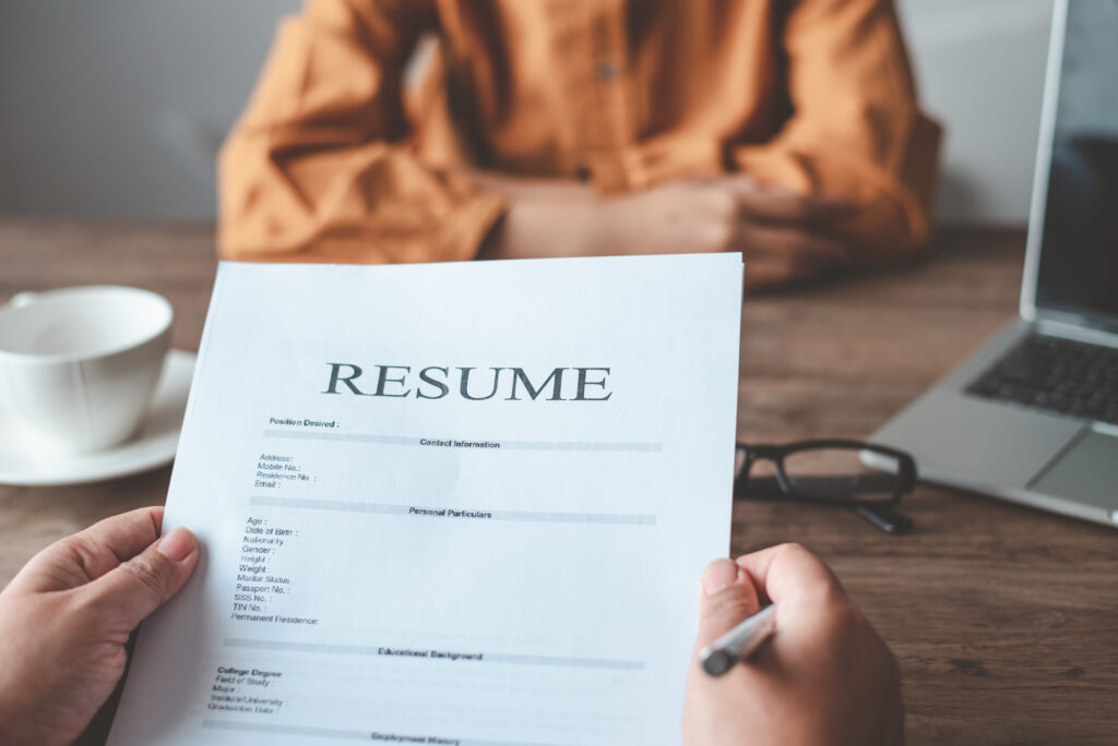 HR managers are interviewing job applicants who understand how to write a resume in order to consider accepting a job as a company.
